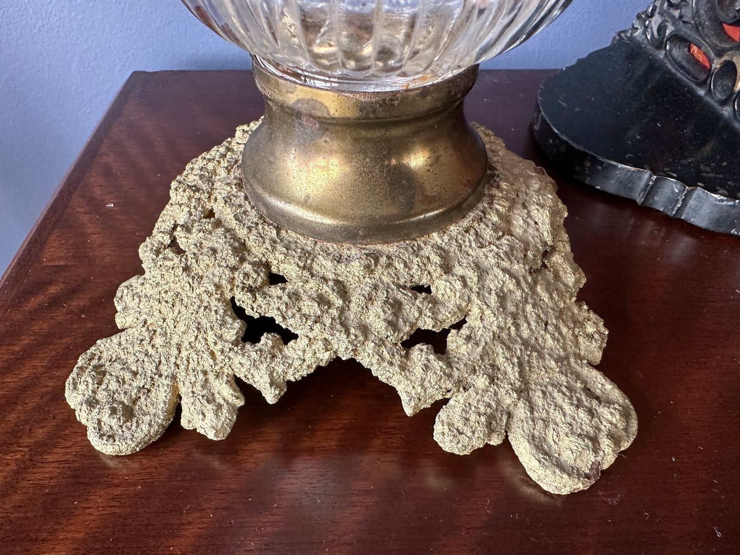Four Lion Head Glass and Brass Pedestal Oil Lamp, close up of base