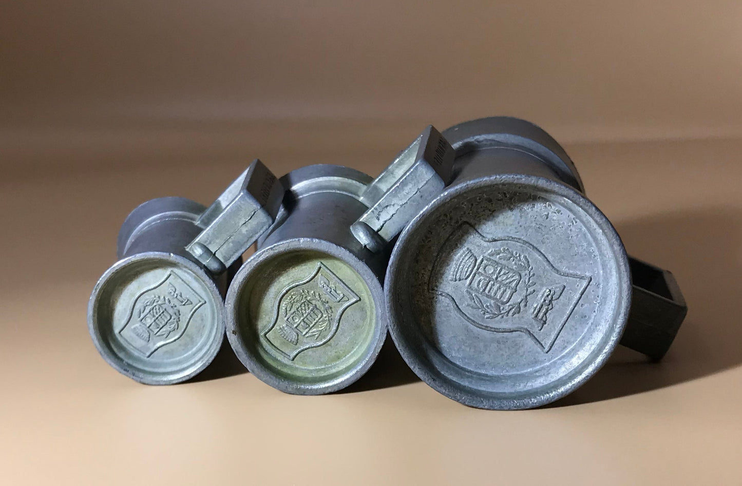 Pewter graduated measuring pitchers - set of 3