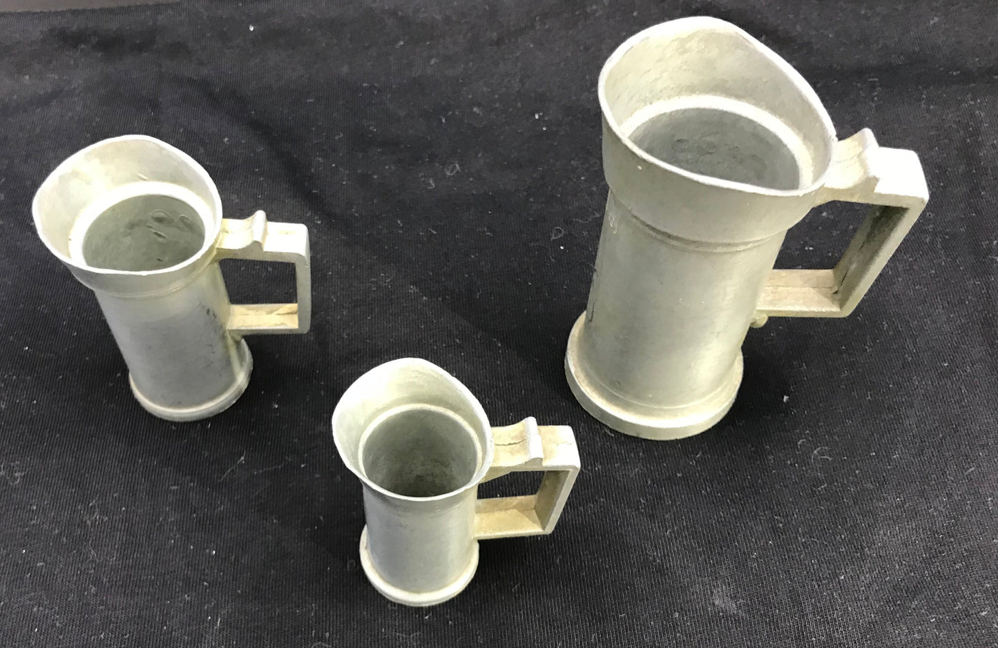 Pewter graduated measuring pitchers - set of 3