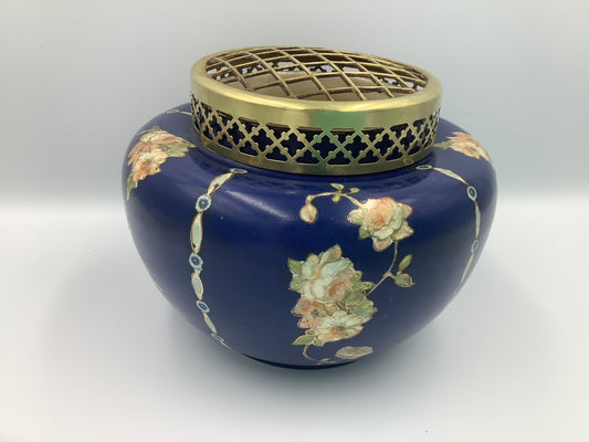 This lovely navy vase with pink/peach floral design circled in gold, and topped by a brass flower frog was made by Gibson & Sons in Burslem England between 1930 and 1950.